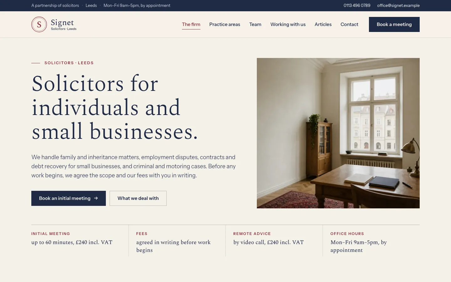 Sample website of Signet Solicitors on a computer