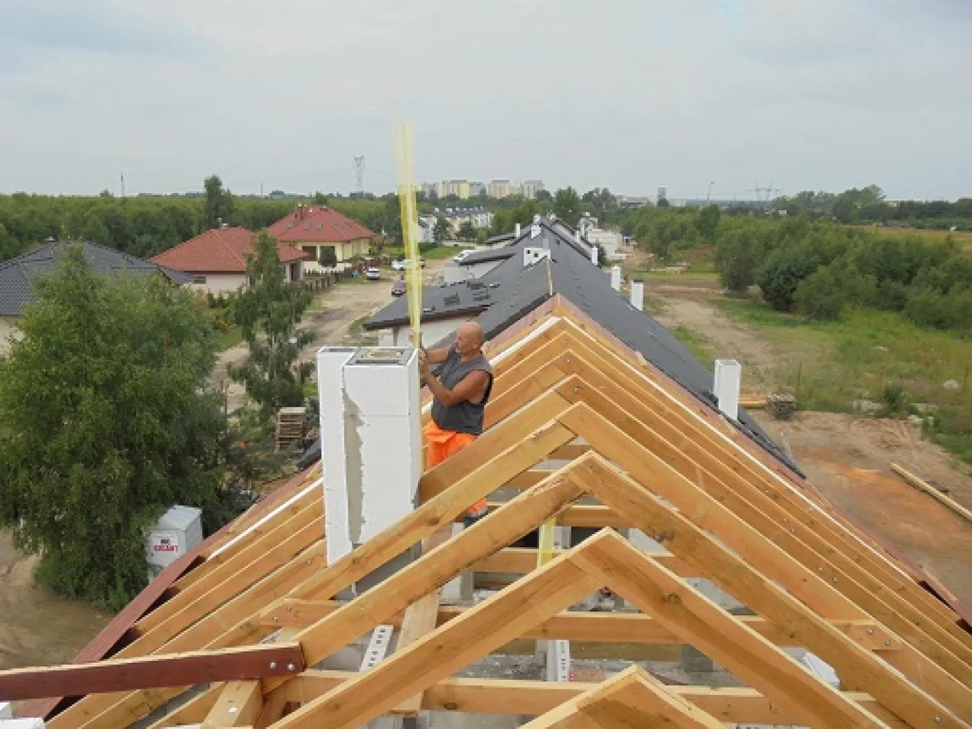 Roof timbers and a ventilation chimney on a house under construction