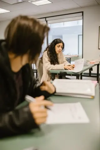Students taking a test in an exam hall